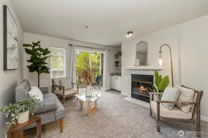 Bright livingroom with wood fireplace