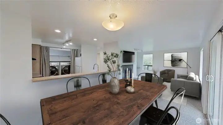 Living room & dining area virtually staged.