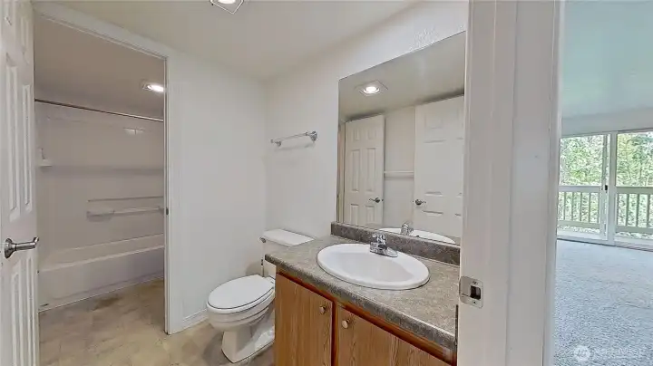Separate access to half bath and tub/shower for guests and 2nd bedroom.