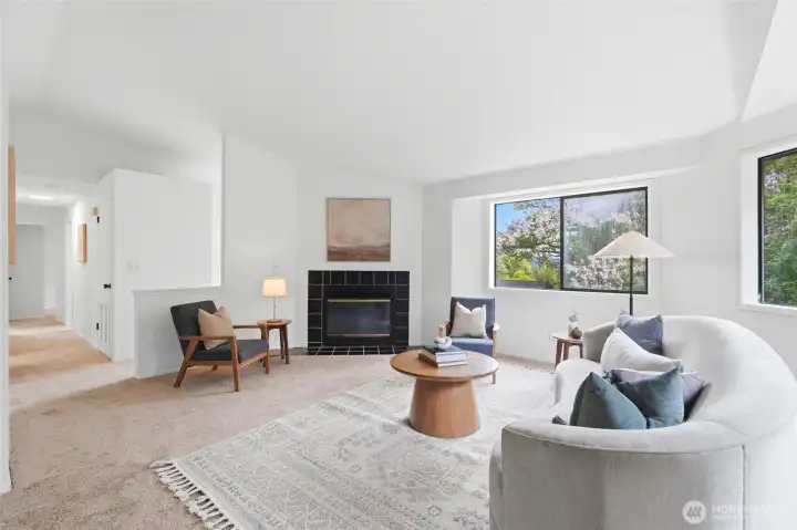 Spacious living room with vaulted ceilings.  Laundry hook ups available in the hallway closet.