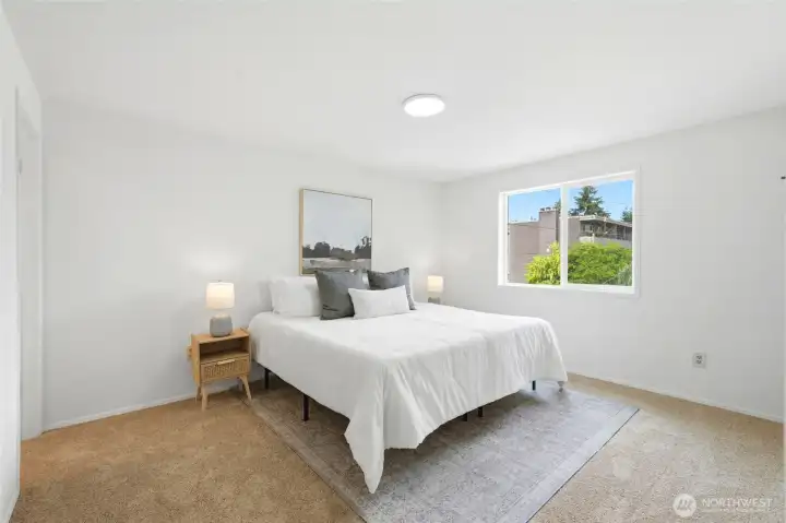 Primary bedroom on the upper level with full bath.