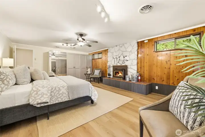 Spacious primary suite features a fireplace and relaxing retreat-like atmosphere.