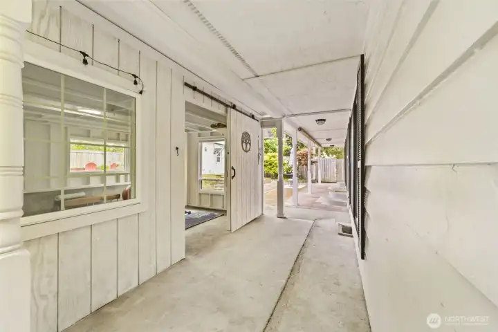 Covered outdoor access connects seamlessly to the yoga and wellness space.
