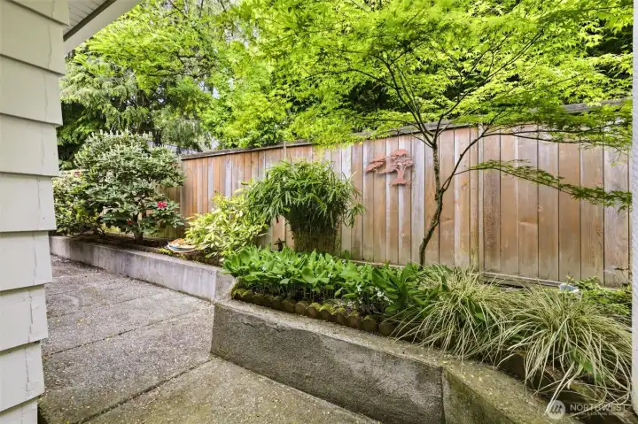 Quiet side walkway enhances privacy and easy outdoor access.  Conveniently located near SeaTac Airport, shopping, dining, parks, and downtown Seattle when it's time to leave home.