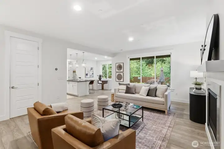 Thoughtfully integrated smart-home upgrades include Lutron lighting with customizable ambiance, a Nest thermostat and video doorbell, plus designer shades from The Shade Store, including motorized living room shades for effortless comfort and style.