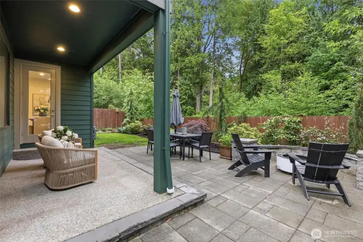 Covered seating areas and multiple entertaining zones create a seamless extension of the home into the outdoors.