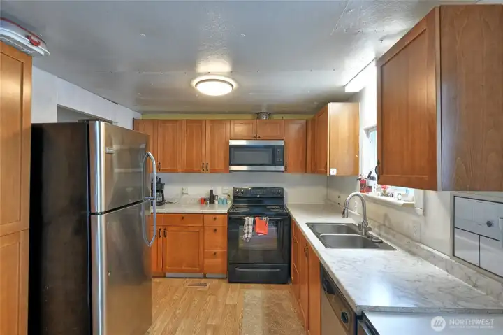Another view of the kitchen area