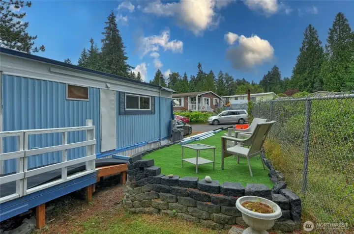 Raised area for all kinds of uses, putting, garden area, or whatever you choose. This is also a ramp for accessing the rear entrance of the home for disabled persons or help moving in and out