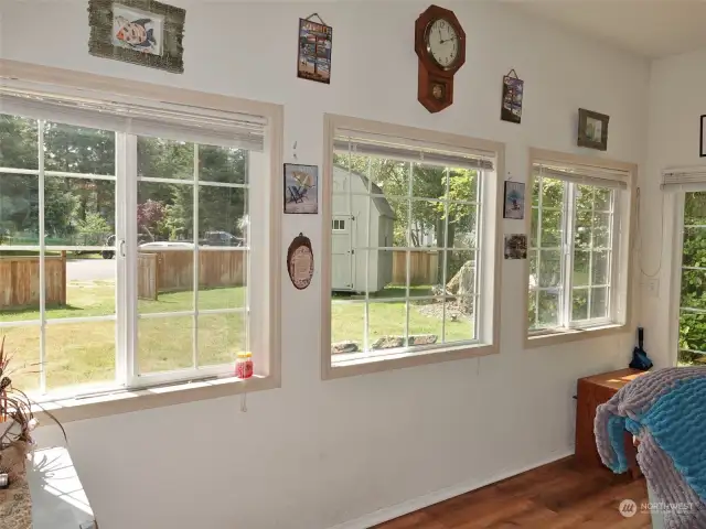 Large windows face the front yard.