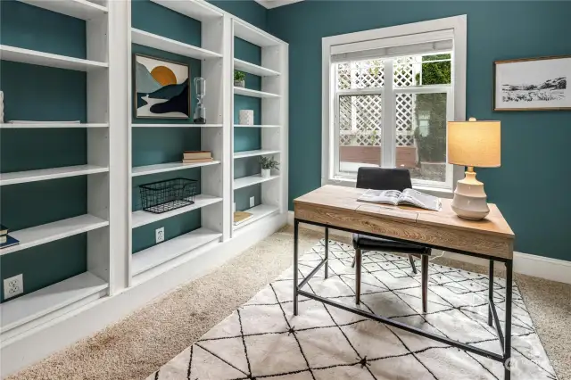 Main floor office or den with built-in bookshelves. This could be a terrific main floor bedroom option too.