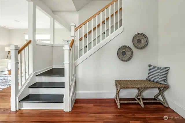 From the spacious entry you can see and feel the charm and details in this home; Brazilian wood flooring, tall 9 foot ceilings, extensive trim and moulding work.