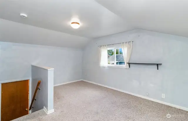 Upper bedroom #4 features a closets & access to attic space.