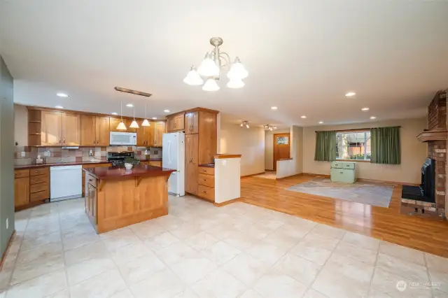 Another shot showing the kitchen and living room.