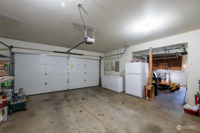 Inside the garage.  Yes that fridge and freezer are included!