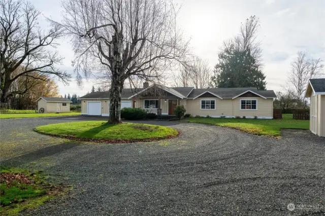 Front of home showing circular driveway.