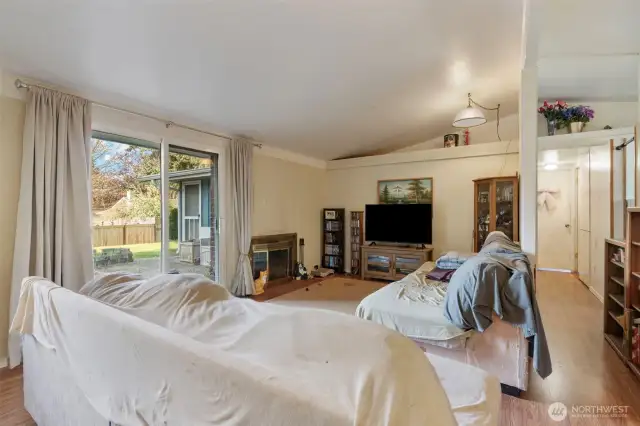 Slider to backyard + woodburning fireplace