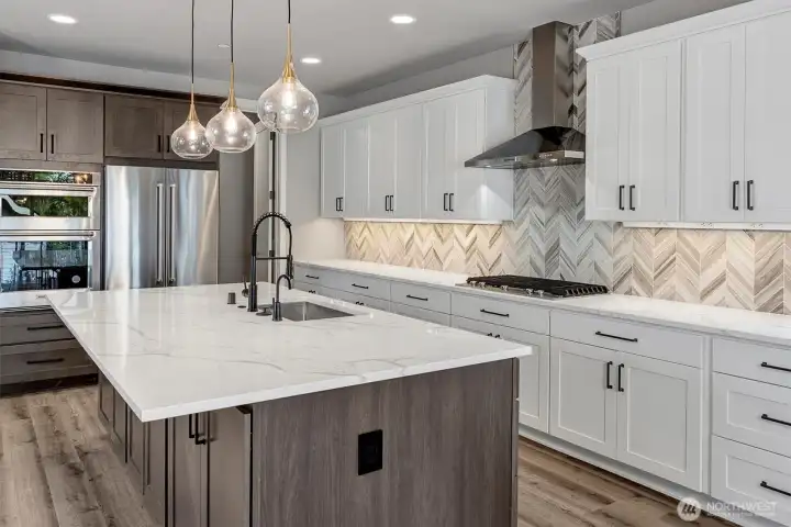 Quartz countertops and tile backsplash