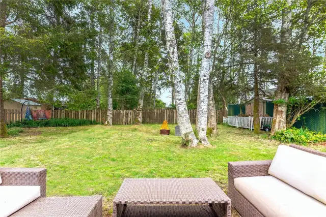 Private fenced backyard with no homes behind the yard