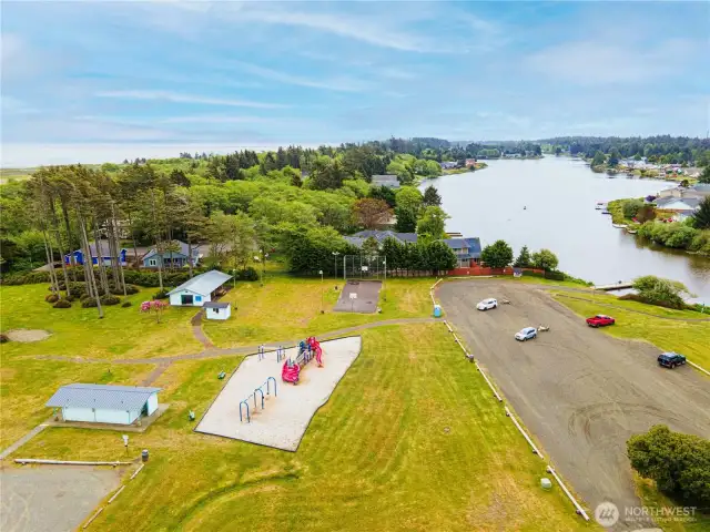 Located next tot he park with the lake and boat launch