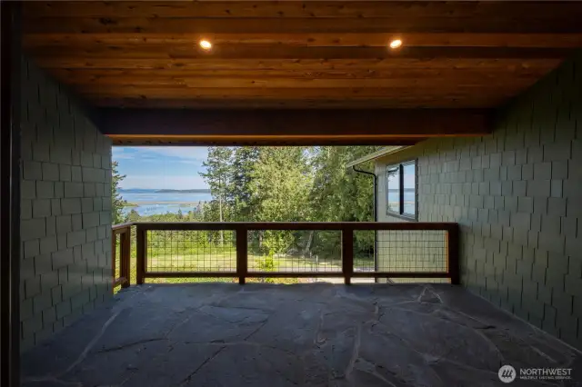 Covered front patio area, look at the flooring.