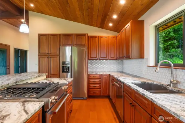 Lovely Kitchen with beautiful granite countertops.