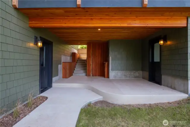 Steps to Home. Door to garage and hobby/art studio.