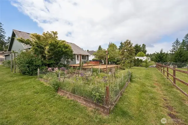 No shade, no fuss, just prime garden real estate with room to grow, fenced for privacy and protection, and sun-drenched enough to keep your green thumb happy all season long.