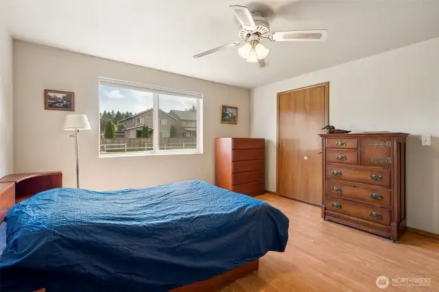 This is not your average squeeze-in-the-nightstand bedroom. There's room for real furniture, think full bed setup, dressers, and yes, even potential space for a remote work zone.