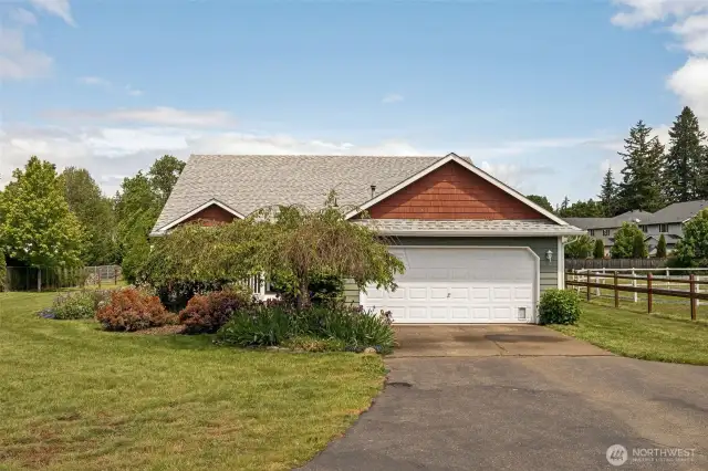 No HOA, no problem! Level lawn, attached 2-car garage, and all the freedom you need to make this property truly yours.
