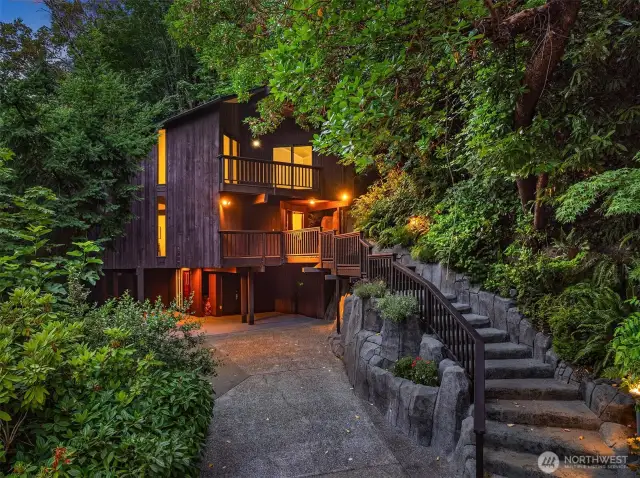 The home, with its dramatic Northwest architecture, blends perfectly in its natural surroundings.