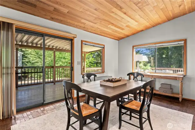 Slider to covered deck and sun deck.  Anyone interested in a beautiful setting for your craft table activities?