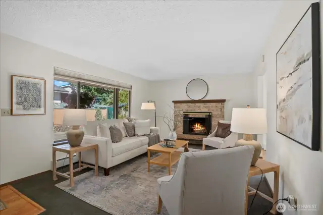 Back in main living room is the smaller of the 2 wood burning masonry Fireplace