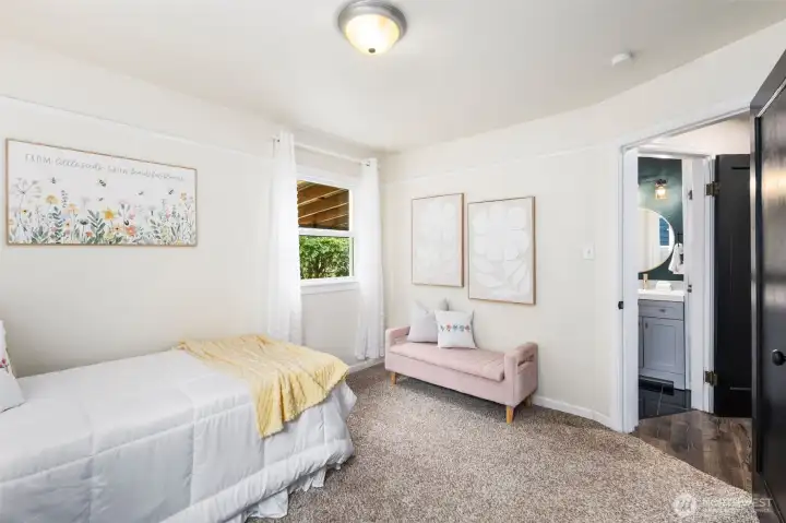 ucked off the hallway, this bedroom offers flexibility—perfect as a guest room, office, or cozy retreat.