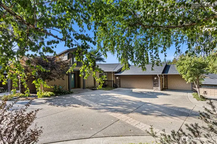 The upper garage is a 3 car garage with lots of additional storage.