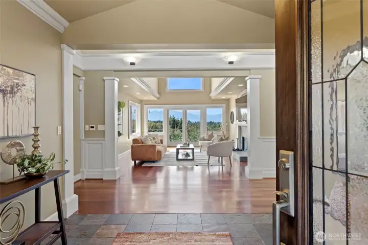 From the moment you enter, you’ll be captivated by the fantastic view visible from the kitchen, dining room, living room, and the expansive deck.