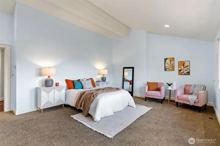 Retreat to the serene primary suite, designed as your private oasis, blending tranquility and style.