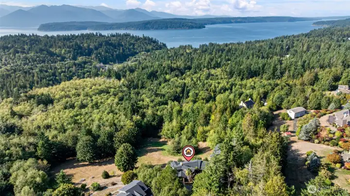 Situated close to shopping and restaurants, this home offers both privacy and accessibility, ensuring comfort and convenience at every turn.