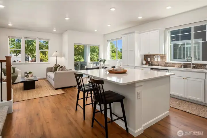 Engineered hardwood floors are throughout the main level. The unit was just painted throughout.