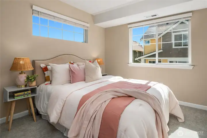 The second of three upper bedrooms.