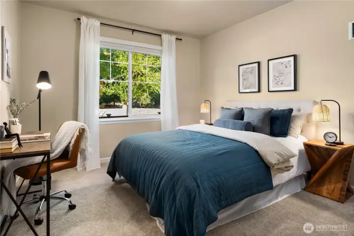 This spacious 4th bedroom is located on the lower level with a beautiful outlook.