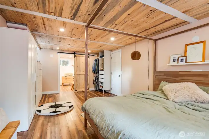 View of ensuite bath off lower level primary bedroom.