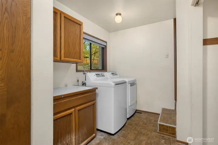 Practical utility room, lower level. Garage access from utility room.