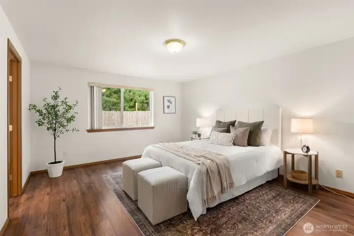 Primary bedroom offers large space and ensuite.