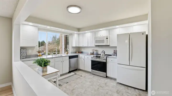 An inviting kitchen that stays connected to the dining and living spaces