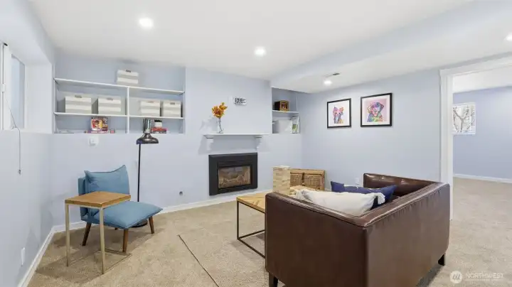 Spacious lower-level living area with flexible layout options