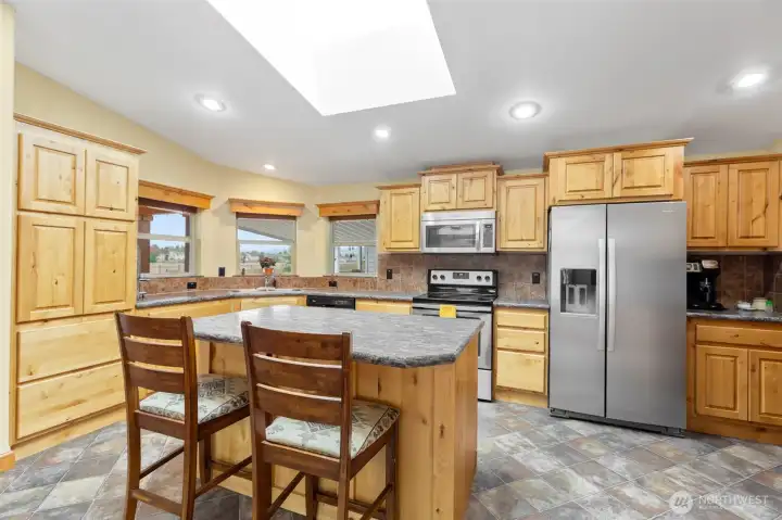 Open concept kitchen with eating space