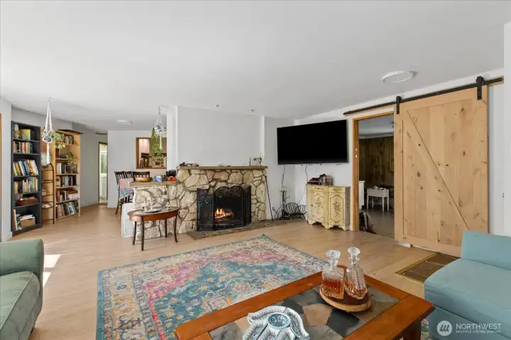 living room looking at rec room and hall to dining