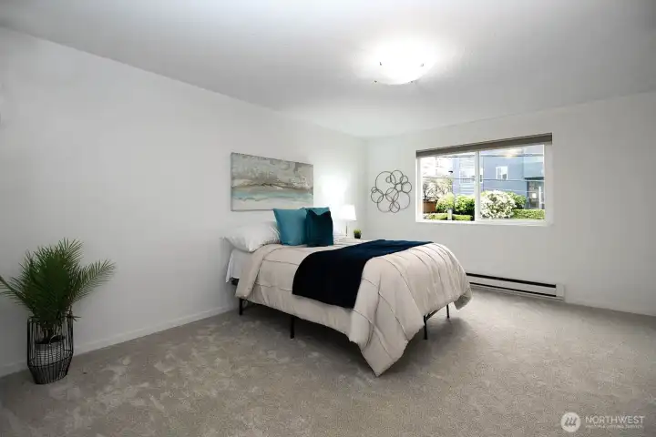Very spacious bedroom with room for a desk or seating area!
