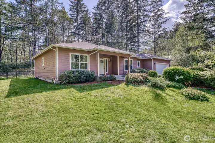 Surrounded by trees for privacy, but still gets lots of light.  So much potential here.