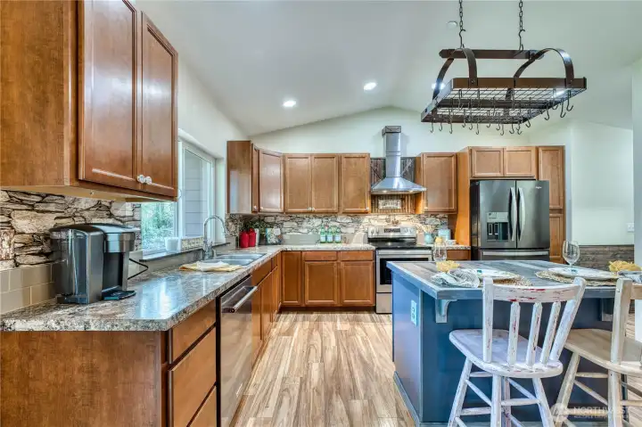 Vaulted ceilings with a pot rack for added convenience.
